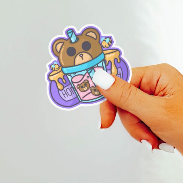 This image shows an hand-drawn adorable sticker, Bear Honey Juice Sticker, which is available to purchase from HunnieByte.com