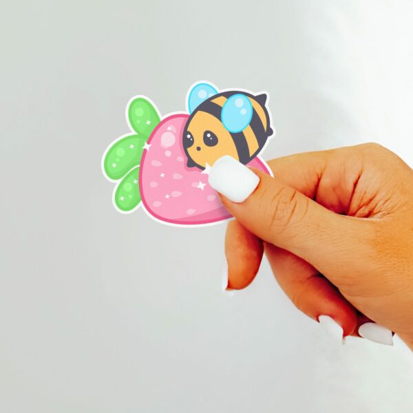 This image shows an hand-drawn adorable sticker, Berry Bee Sticker, which is available to purchase from HunnieByte.com