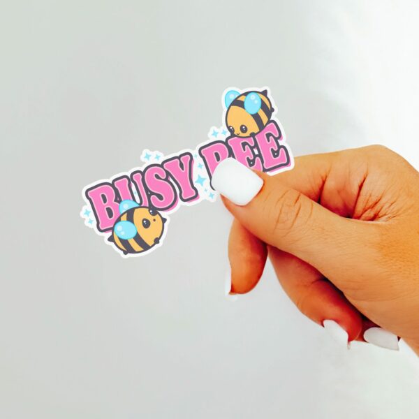 This image shows an hand-drawn adorable sticker, Busy Bee Sticker, which is available to purchase from HunnieByte.com