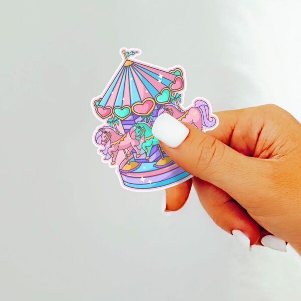 This image shows an hand-drawn adorable sticker, Pastel Carousel Sticker, which is available to purchase from HunnieByte.com