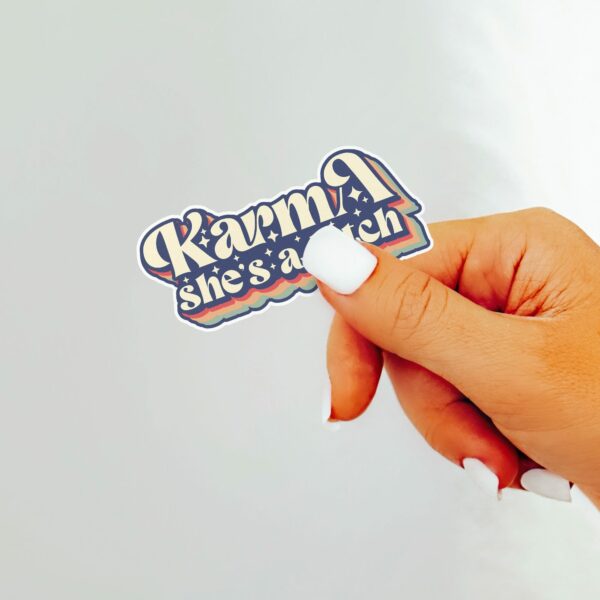 This image shows our adorable sticker finishes, Retro Karma Shes A Bitch Sticker, which is available to purchase from HunnieByte.com