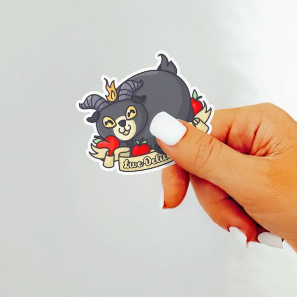 This image shows our adorable sticker finishes, Live Deliciously Goat Sticker, which is available to purchase from HunnieByte.com