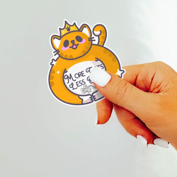 This image shows our adorable sticker finishes, More Cats Less Dicks Sticker, which is available to purchase from HunnieByte.com