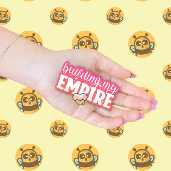 This image shows our adorable sticker finishes, Building My Empire Sticker, which is available to purchase from HunnieByte.com