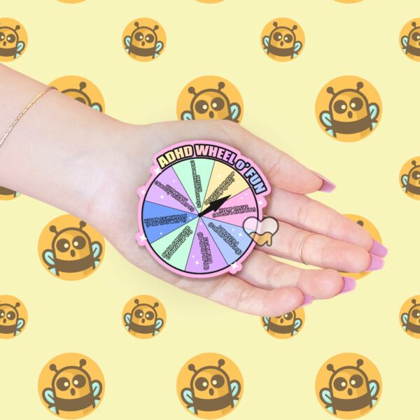 This image shows our adorable sticker finishes, ADHD Wheel O Fun Sticker, which is available to purchase from HunnieByte.com