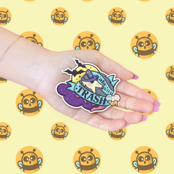 This image shows our adorable sticker finishes, Ala Ka Trash Possum Sticker, which is available to purchase from HunnieByte.com