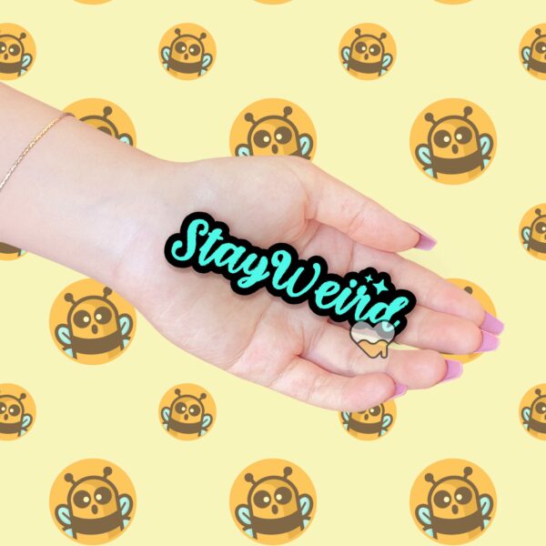 This image shows our adorable sticker finishes, Stay Weird Sticker, which is available to purchase from HunnieByte.com