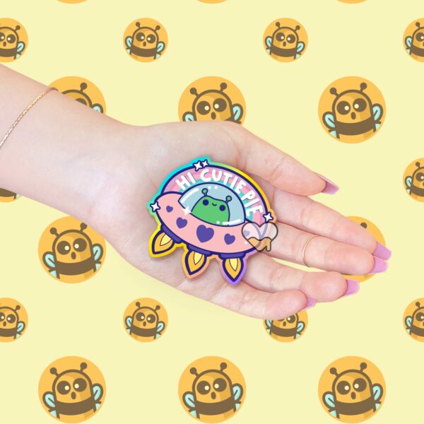 This image shows an hand-drawn adorable sticker, Hi Cutie Pie Alien Sticker, which is available to purchase from HunnieByte.com