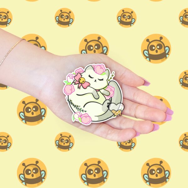 This image shows an hand-drawn adorable sticker, Floral White Kitty Sticker, which is available to purchase from HunnieByte.com