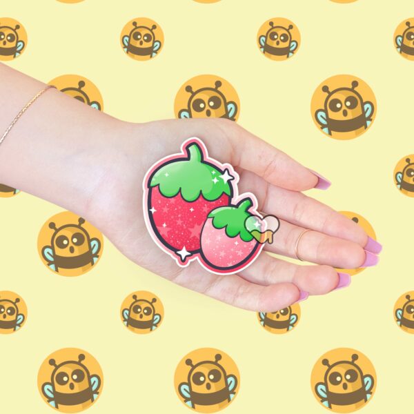 This image shows an hand-drawn adorable sticker, Sparkle Strawberries Sticker, which is available to purchase from HunnieByte.com