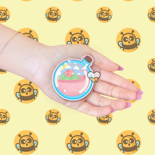 This image shows an hand-drawn adorable sticker, Strawberry Cow Potion Sticker, which is available to purchase from HunnieByte.com