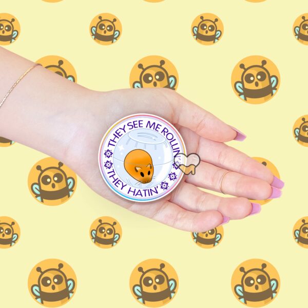 This image shows an hand-drawn adorable sticker, They See Me Rollin Hamster Sticker, which is available to purchase from HunnieByte.com