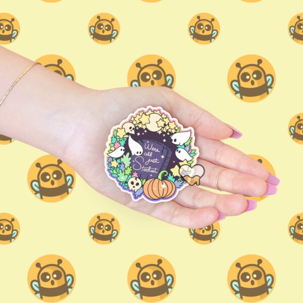 This image shows an hand-drawn adorable sticker, Were All Just Stardust Sticker, which is available to purchase from HunnieByte.com