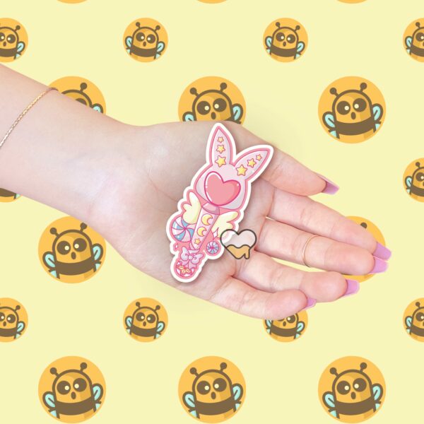 This image shows an hand-drawn adorable sticker, Bunny Magical Wand Sticker, which is available to purchase from HunnieByte.com