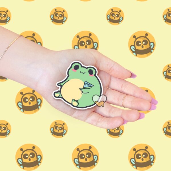 This image shows an hand-drawn adorable sticker, Im OK Frog Sticker, which is available to purchase from HunnieByte.com