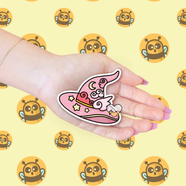 This image shows an hand-drawn adorable sticker, Pretty Pink Magical Hat Sticker, which is available to purchase from HunnieByte.com