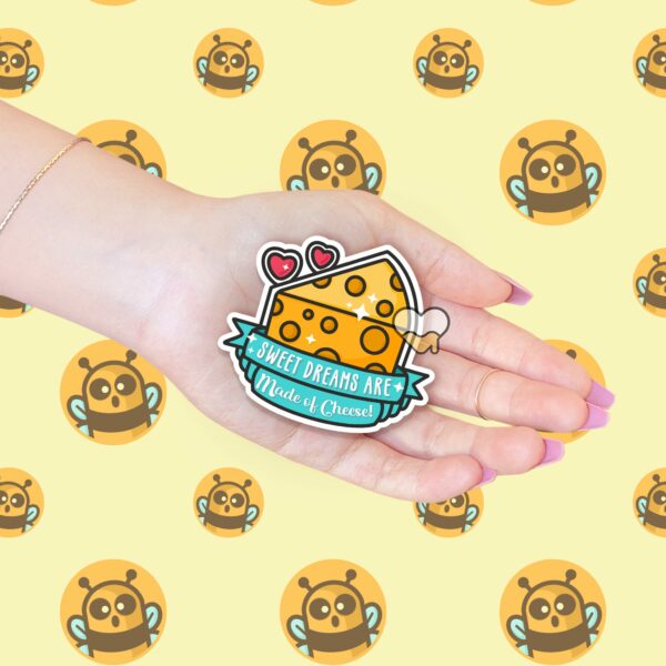 This image shows an hand-drawn adorable sticker, Sweet Dreams Are Made Of Cheese Sticker, which is available to purchase from HunnieByte.com