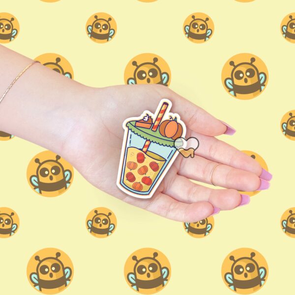 This image shows an hand-drawn adorable sticker, Pumpkin Boba Sticker, which is available to purchase from HunnieByte.com