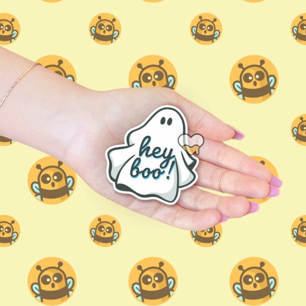 This image shows an hand-drawn adorable sticker, Hey Boo Ghost Sticker, which is available to purchase from HunnieByte.com