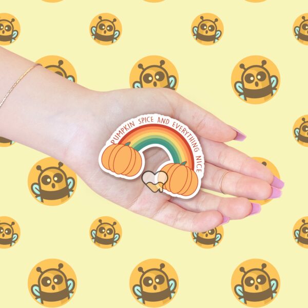 This image shows an hand-drawn adorable sticker, Pumpkin Spice Rainbow Sticker, which is available to purchase from HunnieByte.com