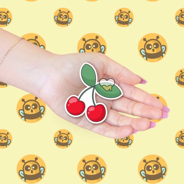 This image shows an hand-drawn adorable sticker, Bright Cherries Sticker, which is available to purchase from HunnieByte.com