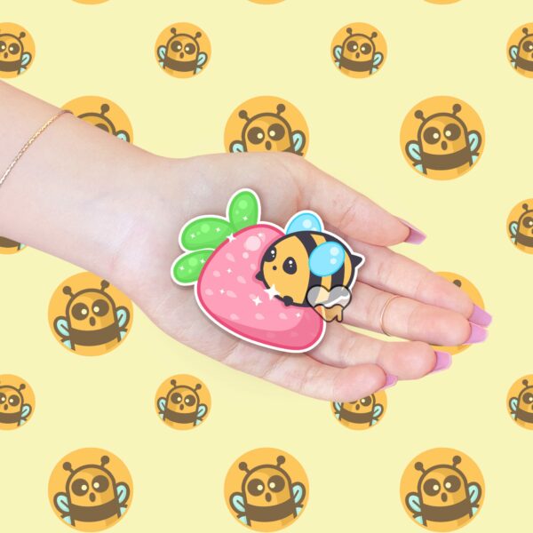 This image shows an hand-drawn adorable sticker, Berry Bee Sticker, which is available to purchase from HunnieByte.com