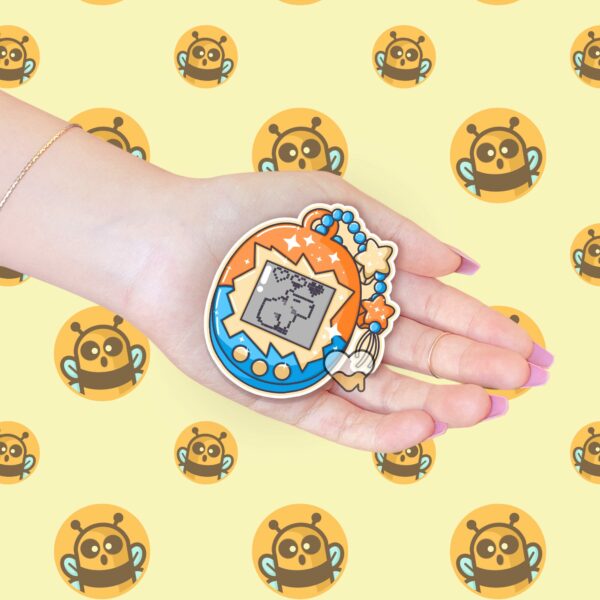 This image shows an hand-drawn adorable sticker, Pet Capybara Game Sticker, which is available to purchase from HunnieByte.com