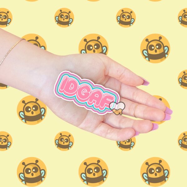 This image shows our adorable sticker finishes, IDGAF Sticker, which is available to purchase from HunnieByte.com