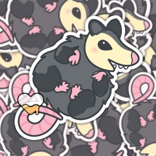 This image shows an hand-drawn adorable sticker, Squishy Possum Baby Sticker, which is available to purchase from HunnieByte.com