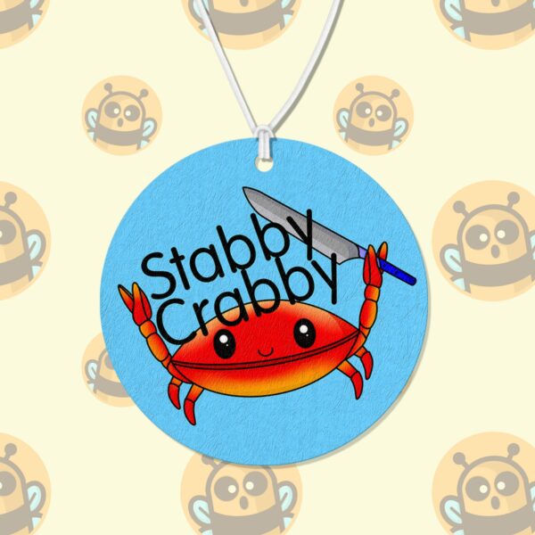 This image shows a hand-drawn adorable air freshener, Stabby Crabby Air Freshener, which is available to purchase from HunnieByte.com