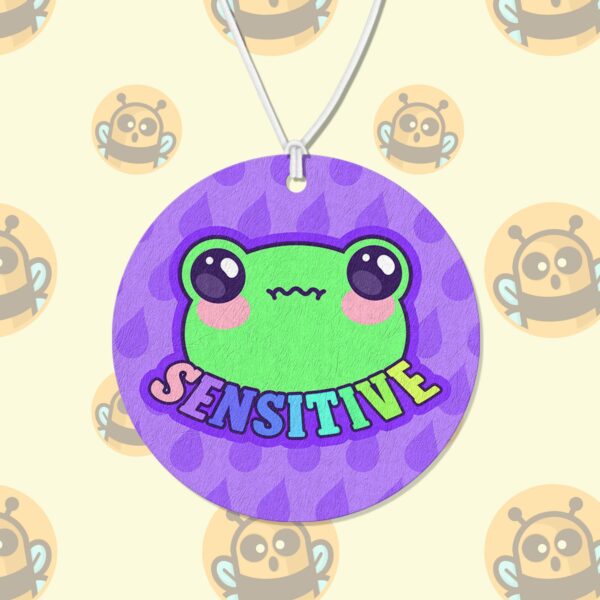 This image shows a hand-drawn adorable air freshener, Sensitive Frog Purple Air Freshener, which is available to purchase from HunnieByte.com