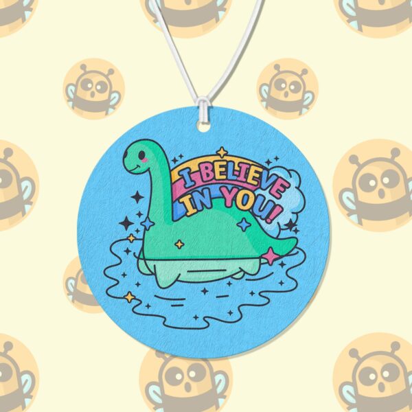 This image shows a hand-drawn adorable air freshener, Nessie I Believe In You Air Freshener, which is available to purchase from HunnieByte.com