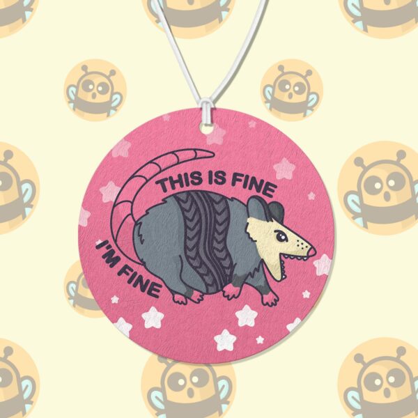 This image shows a hand-drawn adorable air freshener, This is Fine Im Fine Possum Air Freshener, which is available to purchase from HunnieByte.com