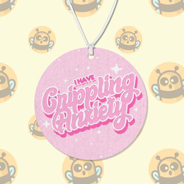 This image shows a hand-drawn adorable air freshener, I Have Crippling Anxiety Pink Air Freshener, which is available to purchase from HunnieByte.com