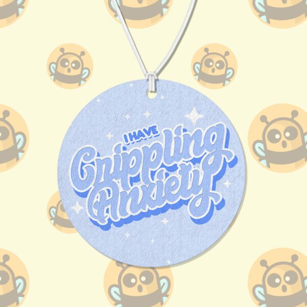 This image shows a hand-drawn adorable air freshener, I Have Crippling Anxiety Blue Air Freshener, which is available to purchase from HunnieByte.com