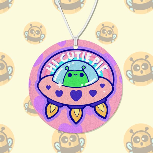 This image shows a hand-drawn adorable air freshener, Hi Cutie Pie Alien Air Freshener, which is available to purchase from HunnieByte.com