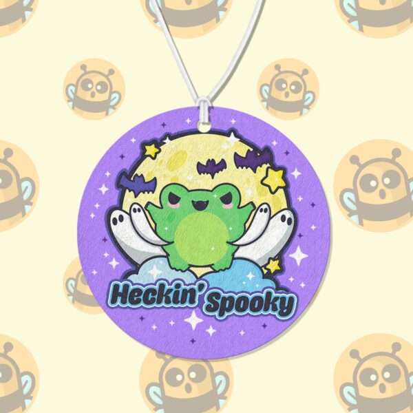 This image shows a hand-drawn adorable air freshener, Heckin Spooky Purple Air Freshener, which is available to purchase from HunnieByte.com