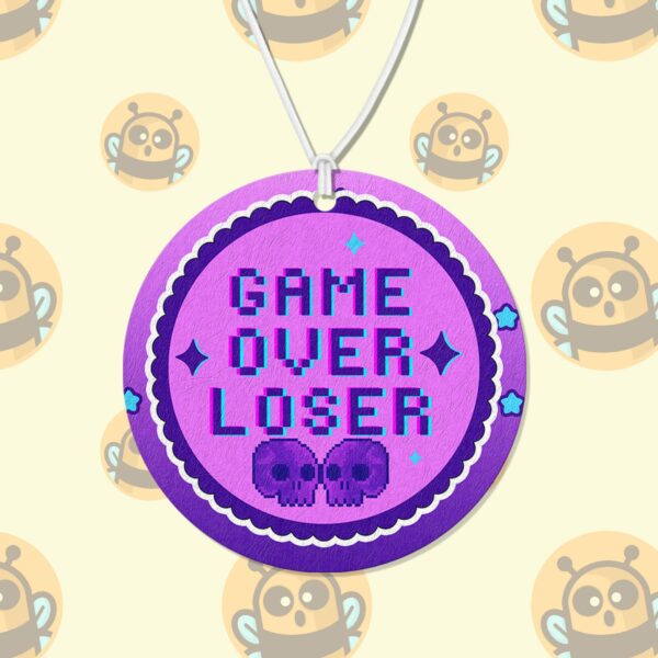 This image shows a hand-drawn adorable air freshener, Game Over Loser Air Freshener, which is available to purchase from HunnieByte.com