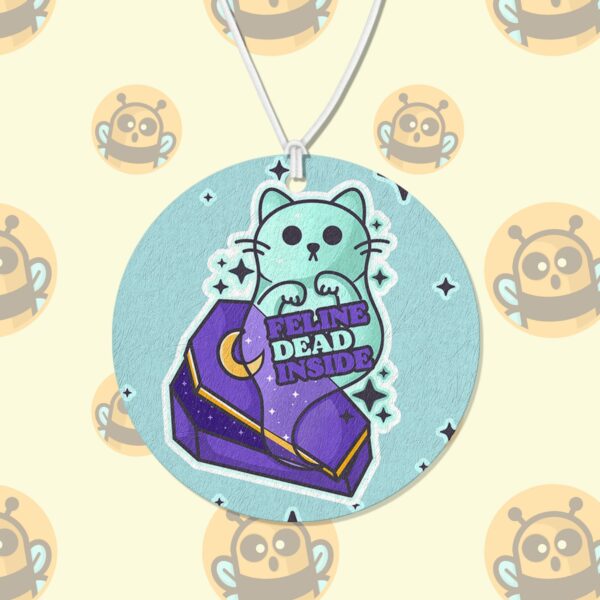 This image shows a hand-drawn adorable air freshener, Feline Dead Inside Kitty Air Freshener, which is available to purchase from HunnieByte.com