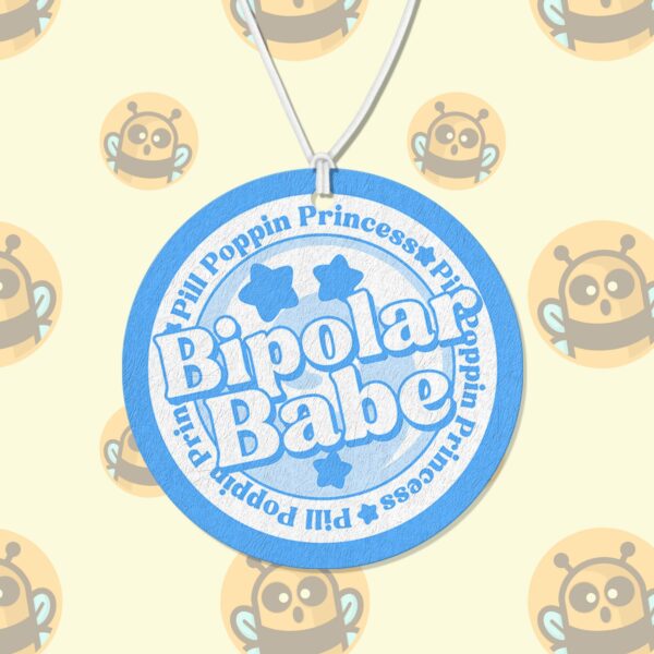 This image shows an adorable hand-drawn air freshener, Bipolar Babe Blue Air Freshener, which is available to purchase from HunnieByte.com