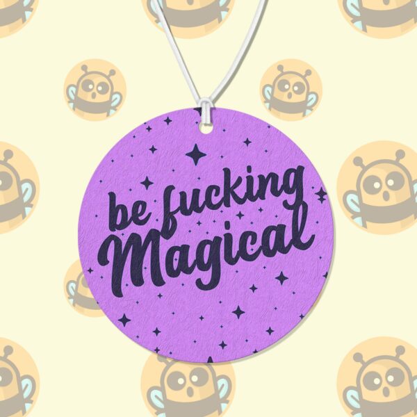 This image shows an adorable hand-drawn air freshener, Be Fucking Magical Purple Air Freshener, which is available to purchase from HunnieByte.com