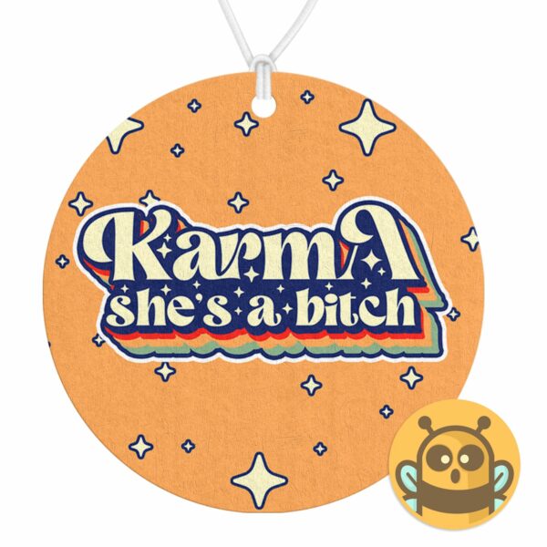 This image shows a hand-drawn adorable air freshener, Karma Shes A Bitch Air Freshener, which is available to purchase from HunnieByte.com