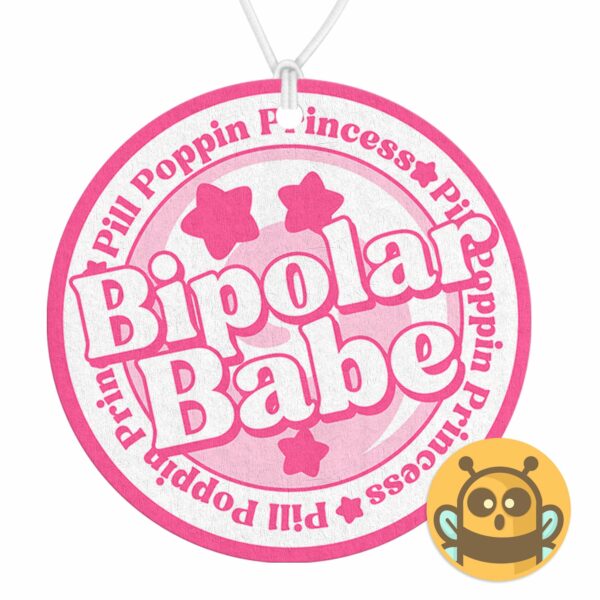 This image shows an adorable hand-drawn air freshener, Bipolar Babe Pink Air Freshener, which is available to purchase from HunnieByte.com