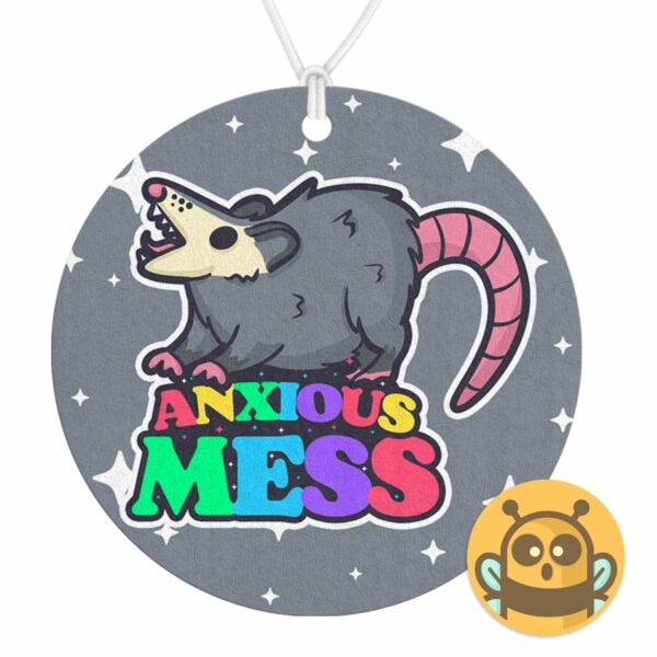 This image shows an adorable hand-drawn air freshener, Anxious Mess Possum Air Freshener, which is available to purchase from HunnieByte.com