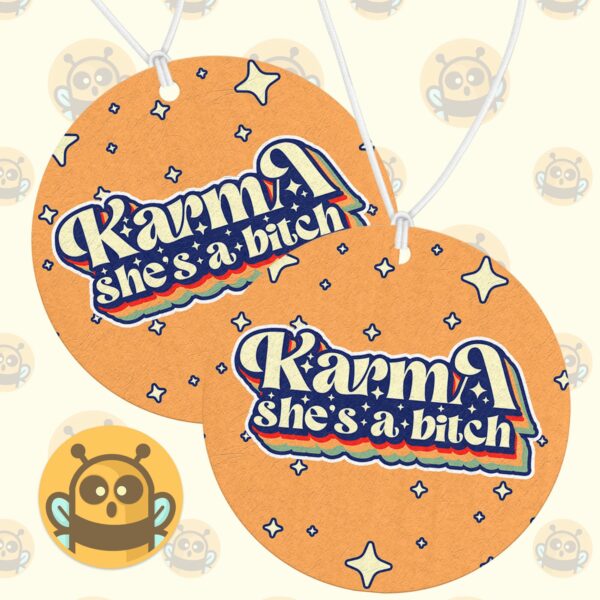 This image shows a hand-drawn adorable air freshener, Karma Shes A Bitch Air Freshener, which is available to purchase from HunnieByte.com