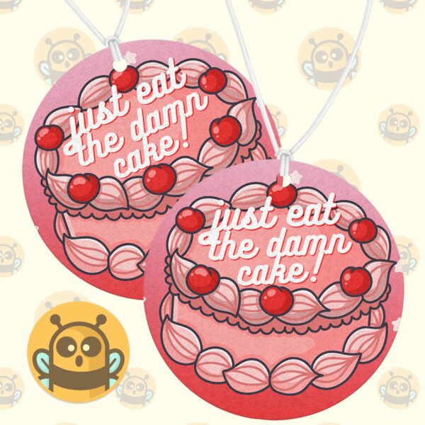 This image shows a hand-drawn adorable air freshener, Just Eat The Damn Cake Air Freshener, which is available to purchase from HunnieByte.com