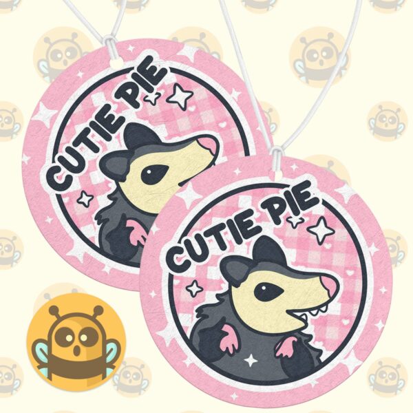 This image shows an adorable hand-drawn air freshener, Cutie Pie Possum Air Freshener, which is available to purchase from HunnieByte.com