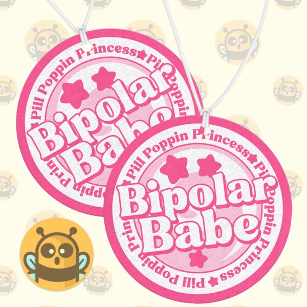 This image shows an adorable hand-drawn air freshener, Bipolar Babe Pink Air Freshener, which is available to purchase from HunnieByte.com