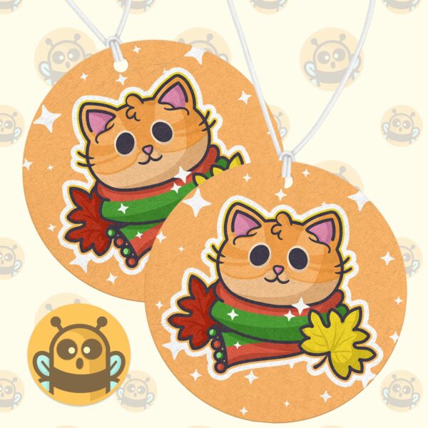 This image shows an adorable hand-drawn air freshener, Autumn Ginger Kitty Air Freshener, which is available to purchase from HunnieByte.com