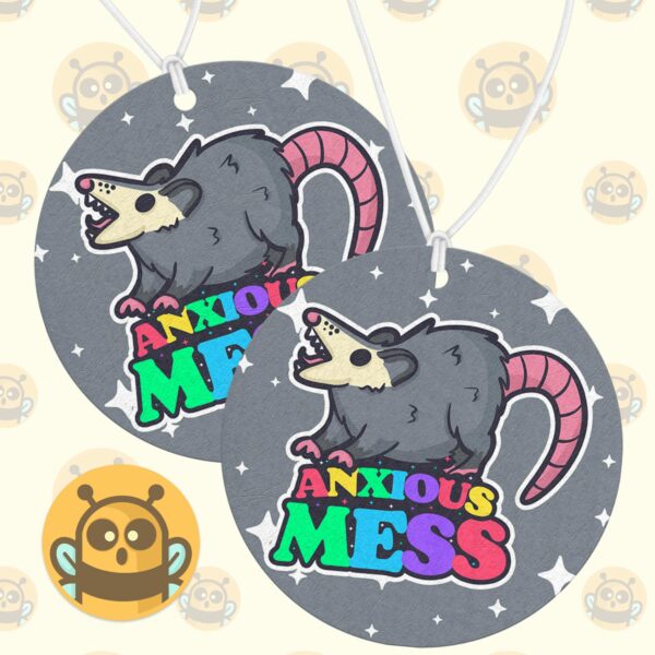 This image shows an adorable hand-drawn air freshener, Anxious Mess Possum Air Freshener, which is available to purchase from HunnieByte.com